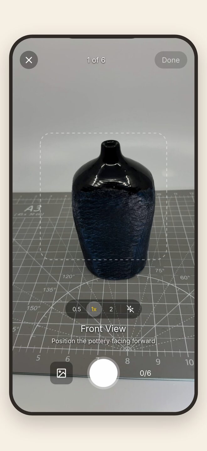 The capture screen, a vase framed inside the guide overlay